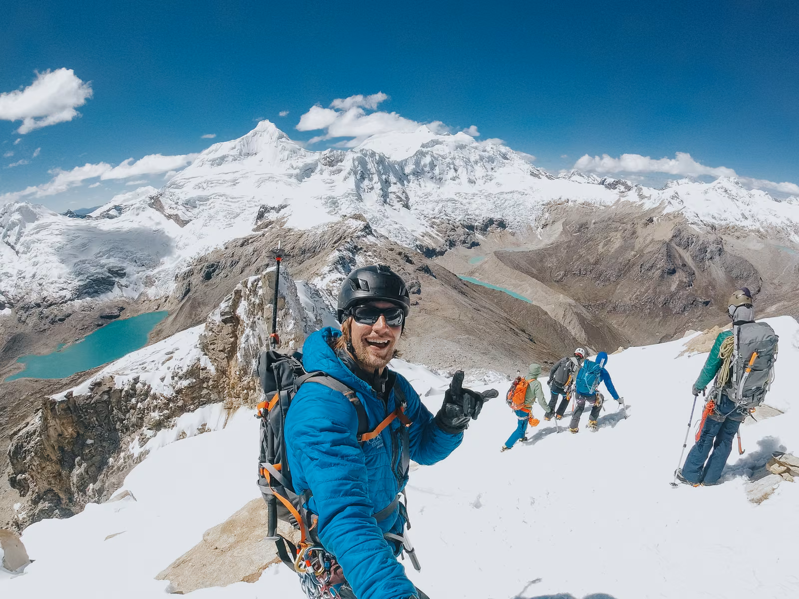 People with sky, snow, Cordillera Blanca, Peru