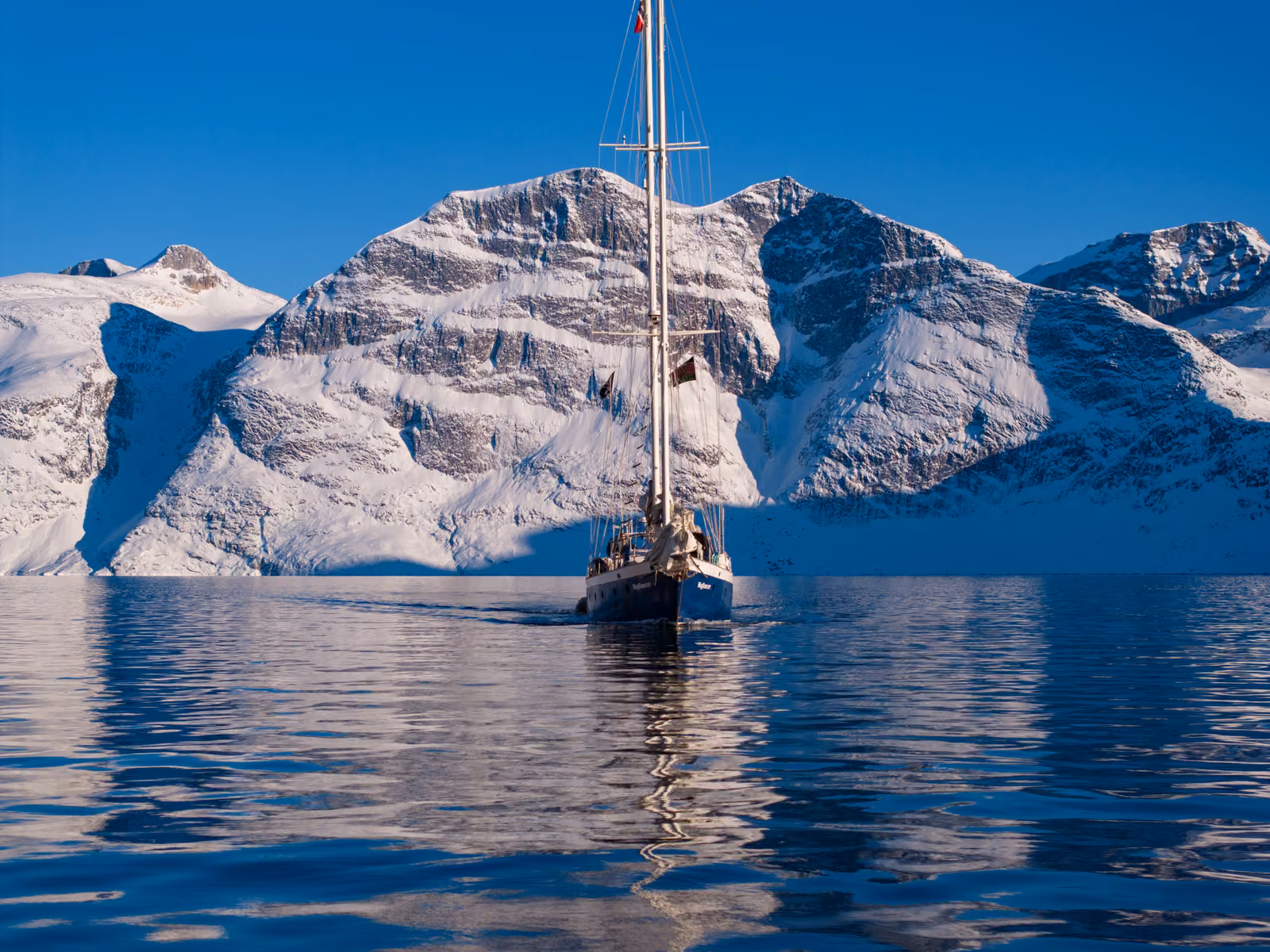 A sailboat, sky, mountains, Nuuk, Greenland