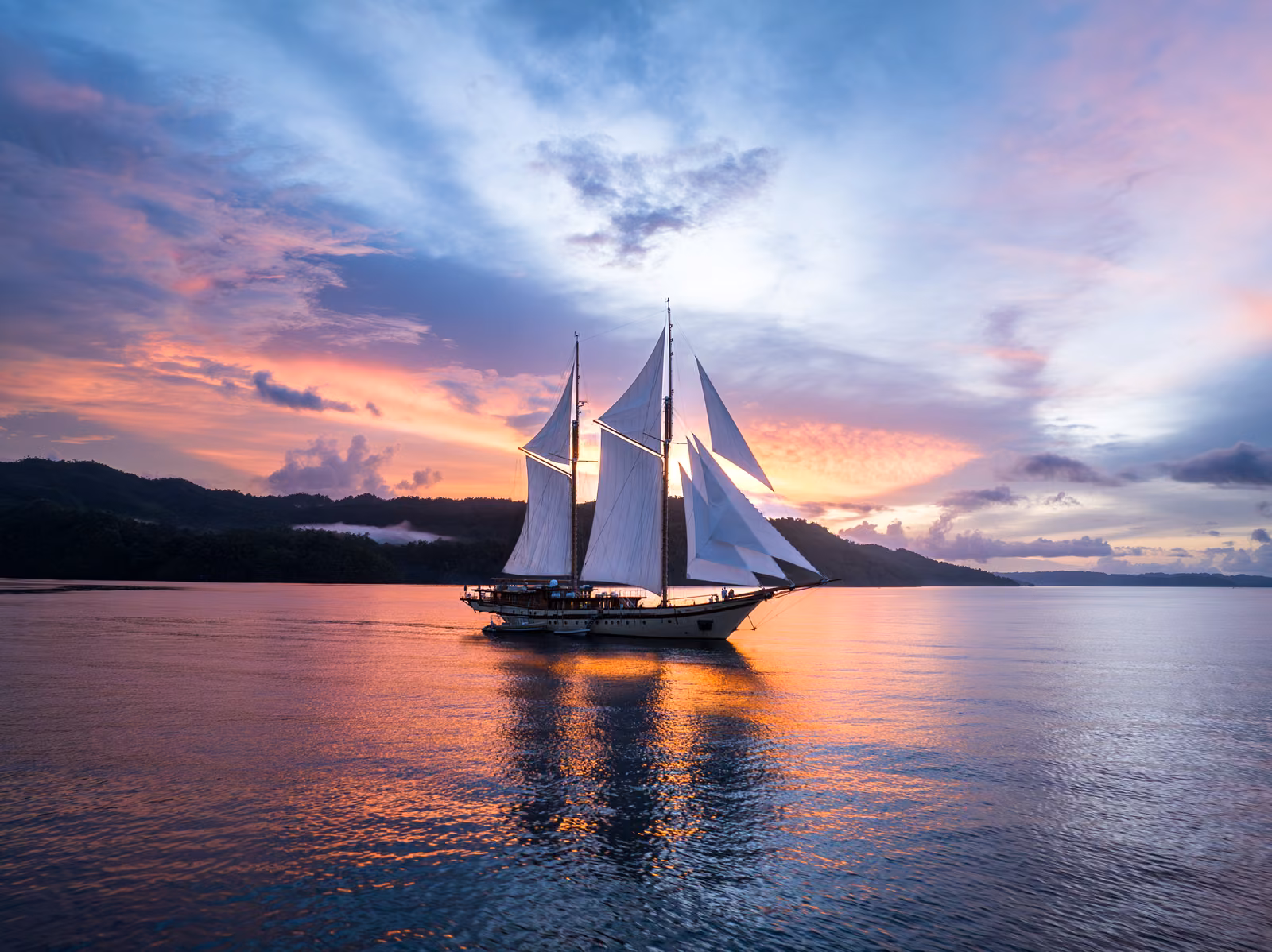 A sailboat, sky, open water, Raja Ampat, Indonesia
