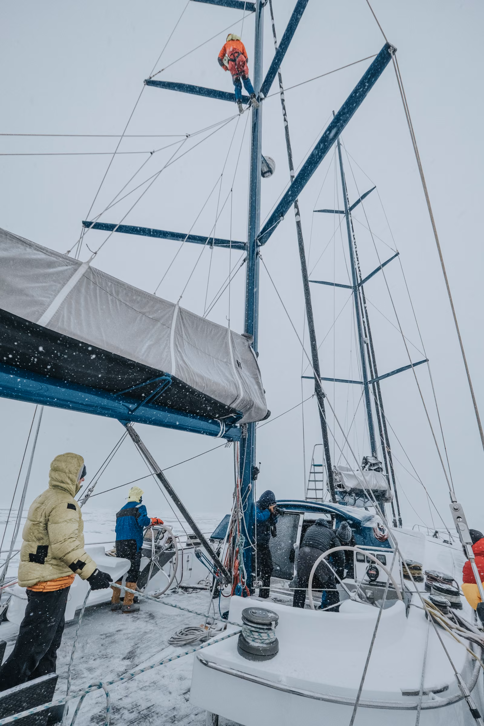 People with a sailboat, Arctic Ocean