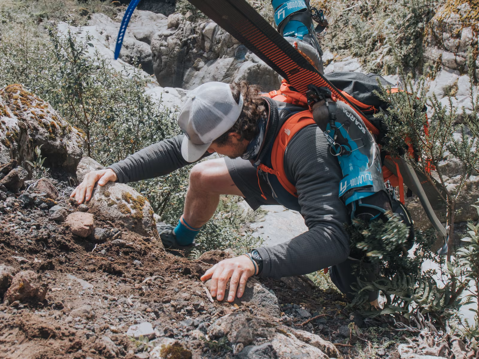 People with rock, Volcán Corcovado, Chile