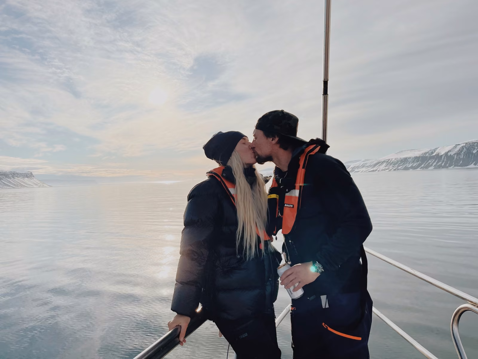 People with sky, open water, Longyearbyen, Svalbard