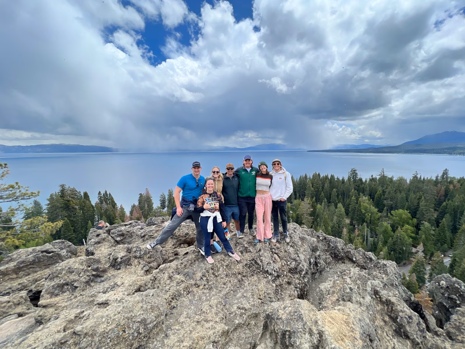 People with sky, rock, Lake Tahoe, California