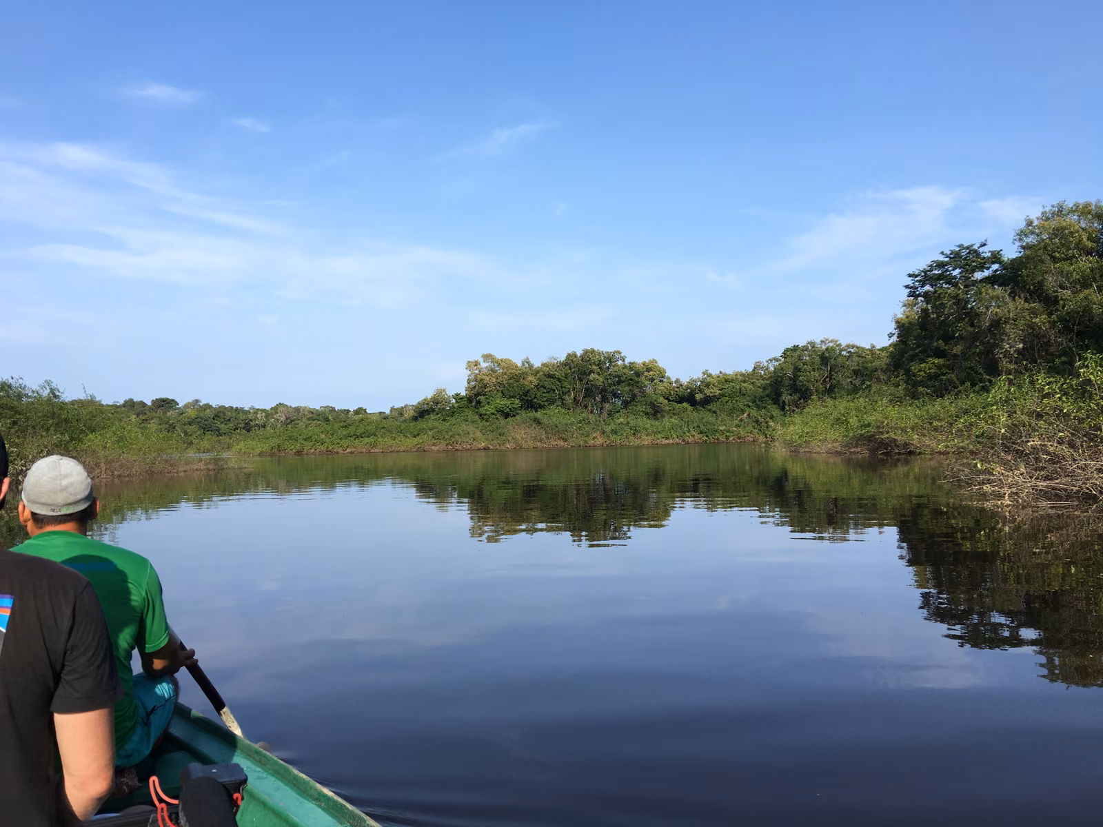 People with sky, open water, Rio Negro, Brazil